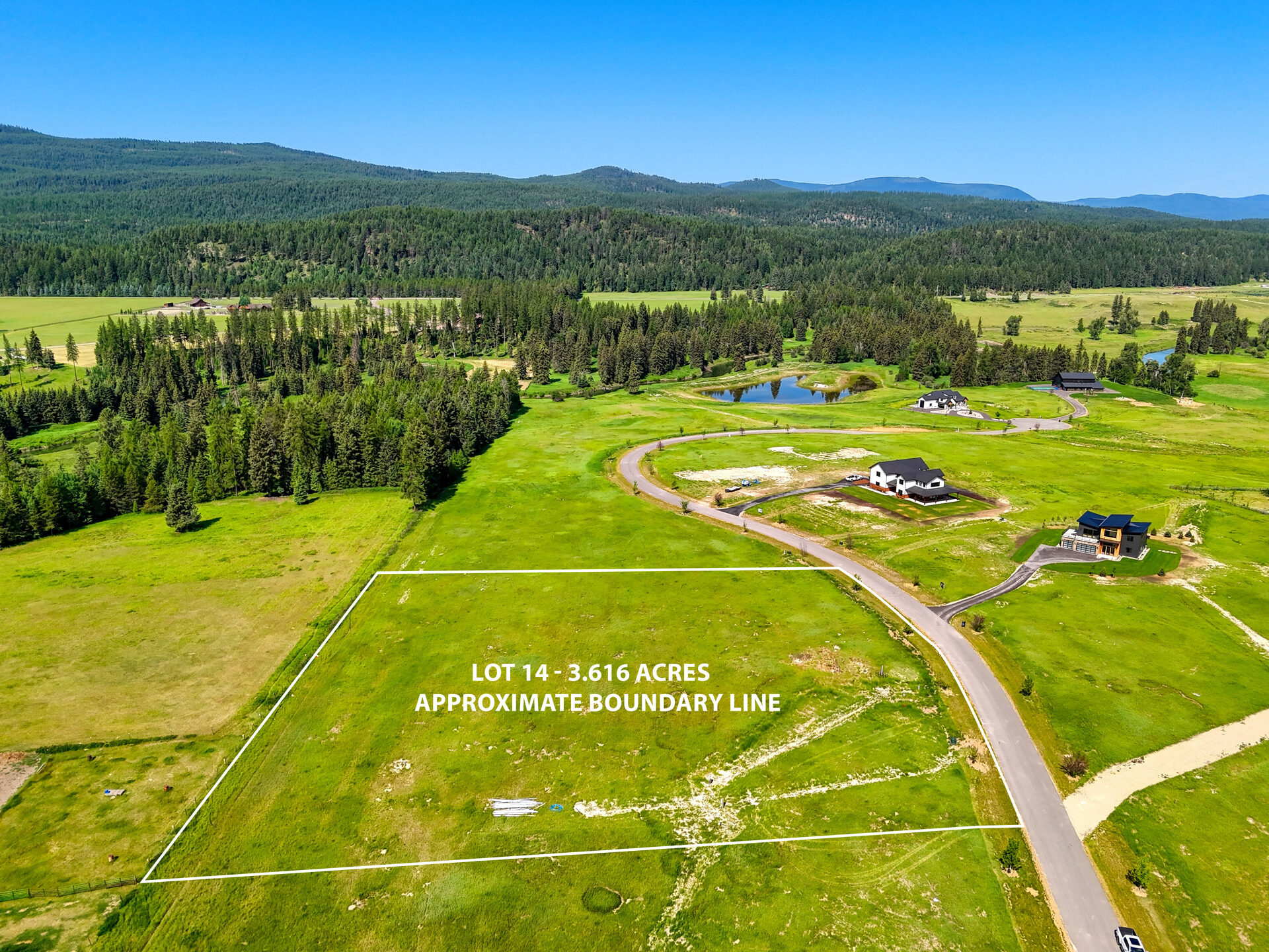 Aerial showing the approximate boundary of Lot 14, 3.616 acres, at 164 River Ranch Rd, Whitefish